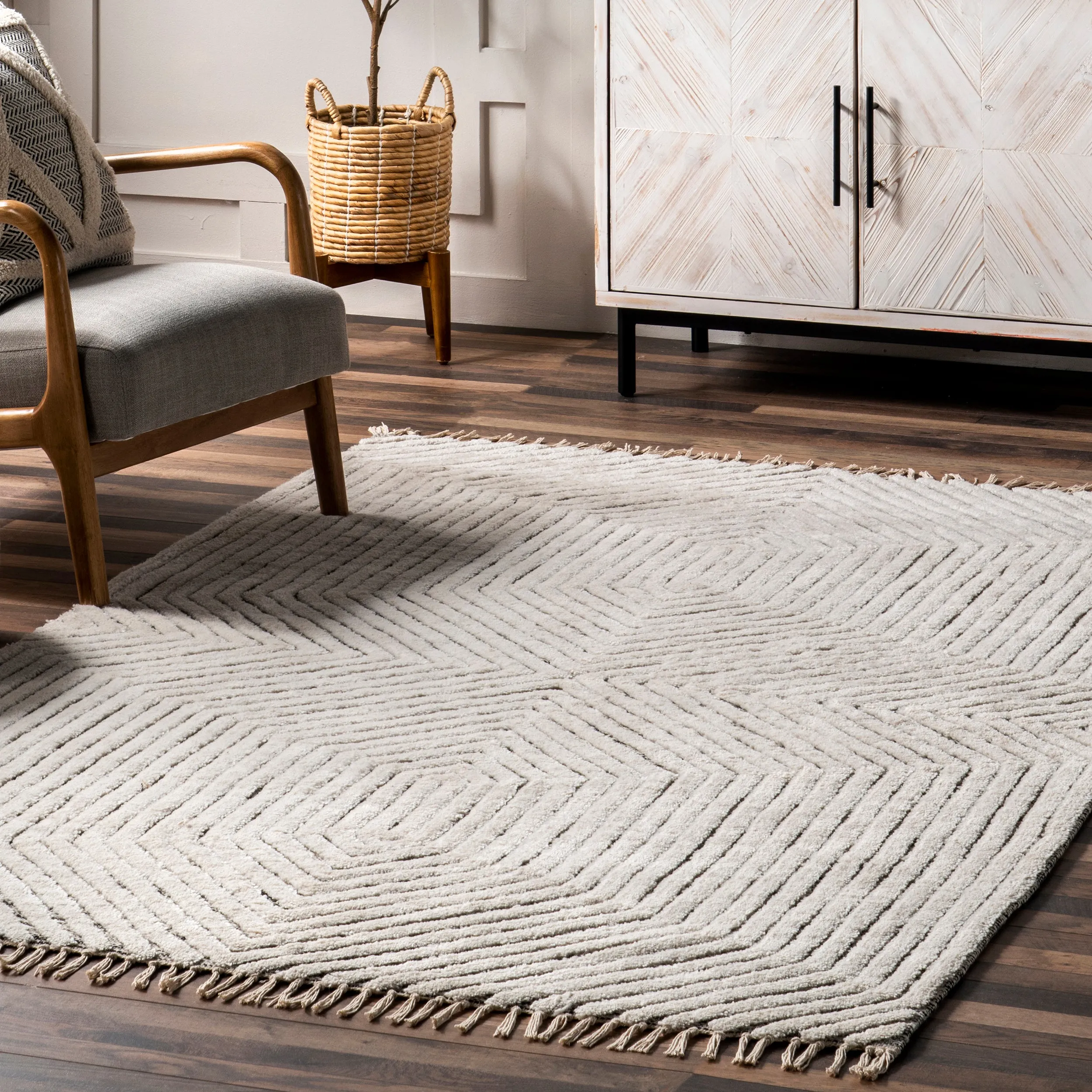 Sherrell Modern High/Low Tassel Area Rug