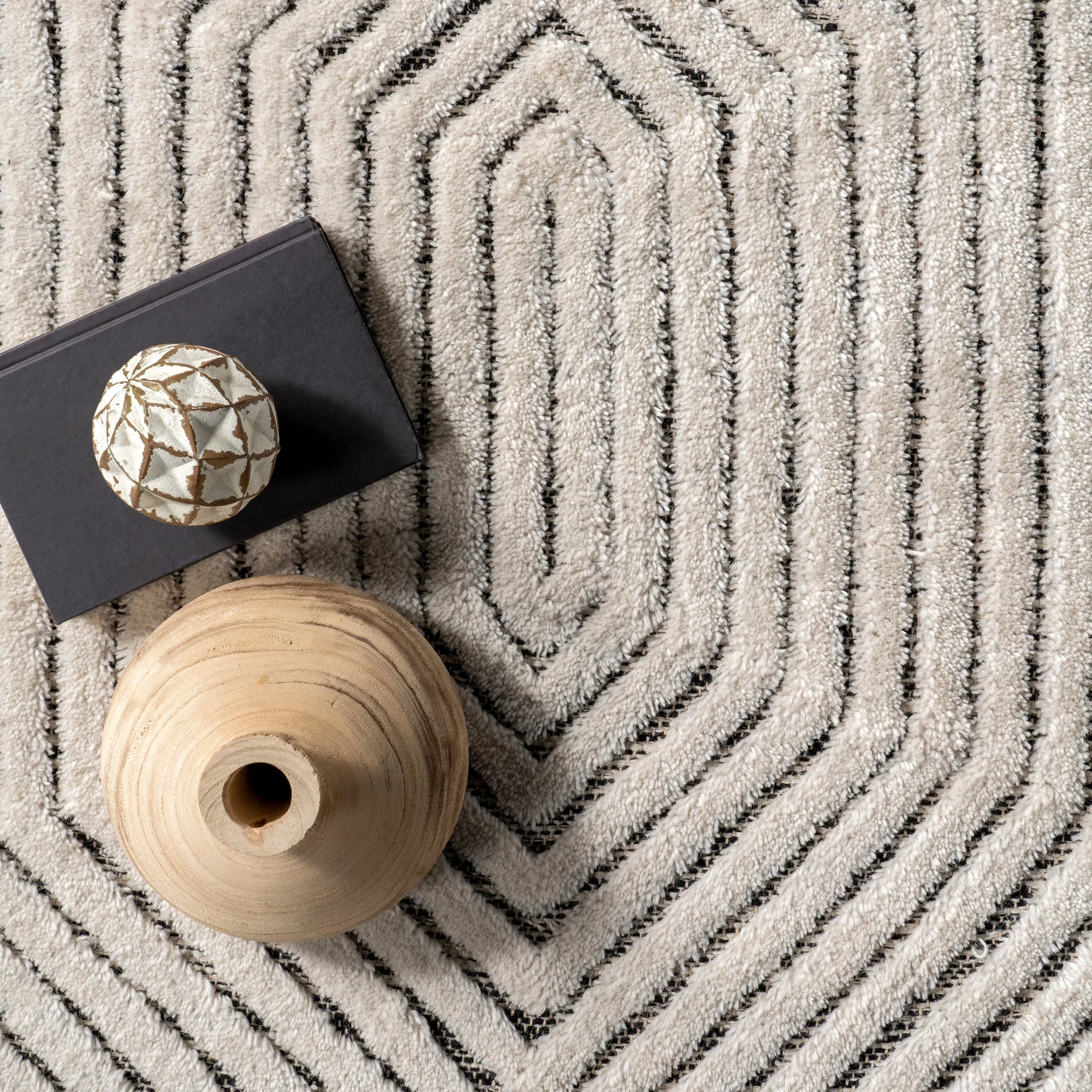 Sherrell Modern High/Low Tassel Area Rug