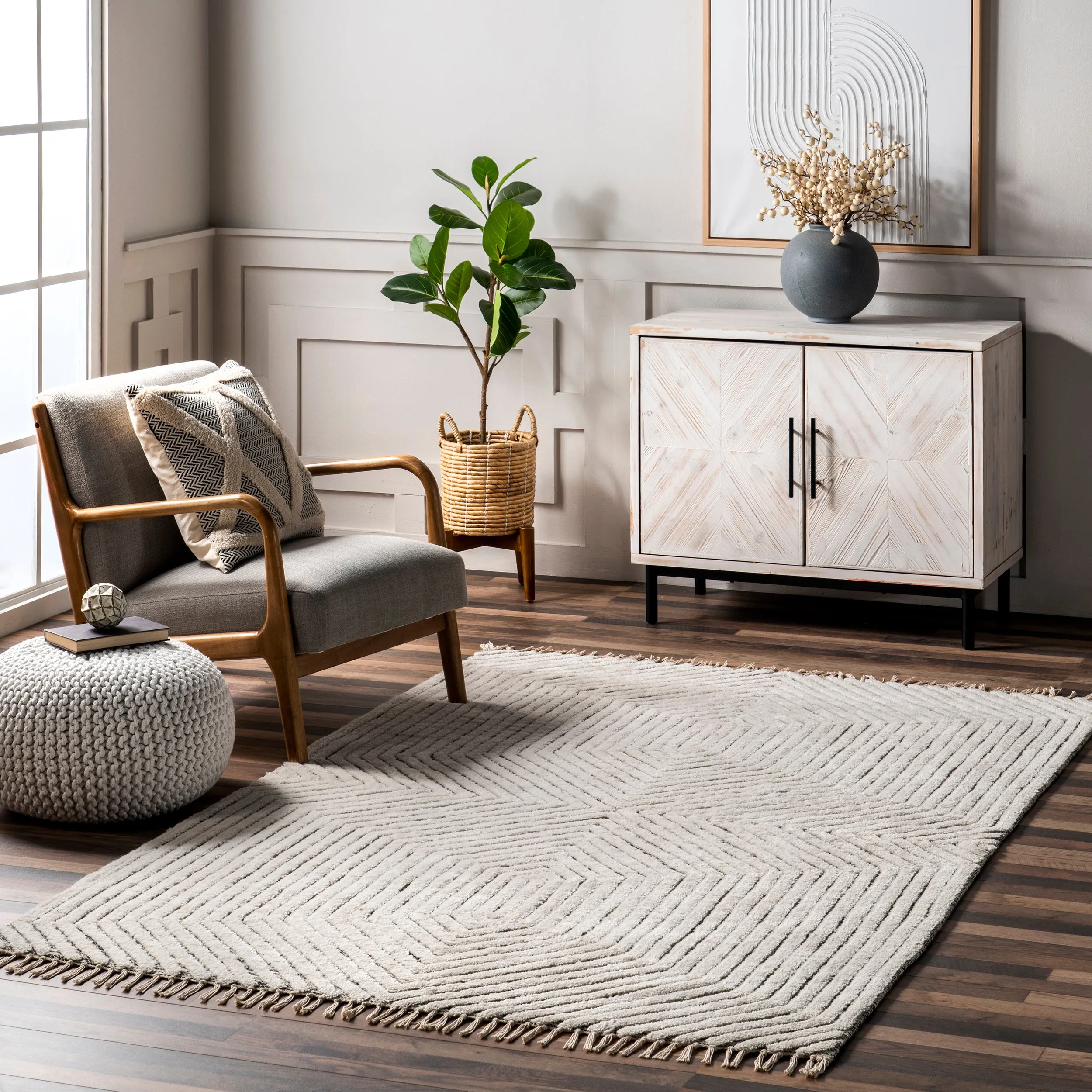 Sherrell Modern High/Low Tassel Area Rug